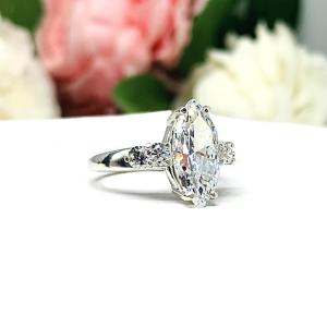 Marquise 14x7mm Cubic Zirconia Round Accents Engagement Ring