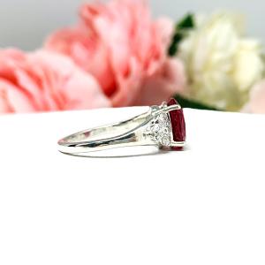 Lab Created Ruby Oval Ring Round CZ Accented Sterling Silver