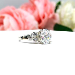 Oval Cubic Zirconia Round Accents Engagement Ring