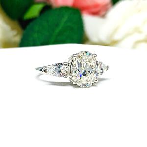 Oval Pear Near Colorless Cubic Zirconia Three Stone Engagement Ring