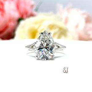 Pear Near Colorless Cubic Zirconia Split Shank Engagement Ring