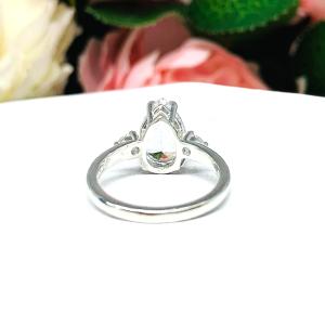 Lab White Sapphire Pear Ring Round Side Stones