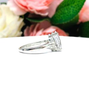 Lab White Sapphire Pear Ring Round Side Stones