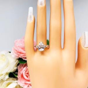 Lab White Sapphire Pear Ring Round Side Stones