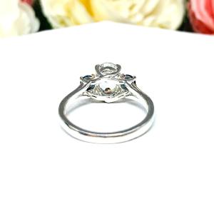 White Topaz 8x6mm Oval with Round London Blue Topaz Ring
