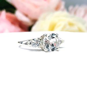 Natural White Topaz Round With Pear Side Stones Ring
