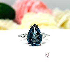 London Blue Topaz Pear Moissanite Ring - Sterling silver setting- Round moissanite side stones