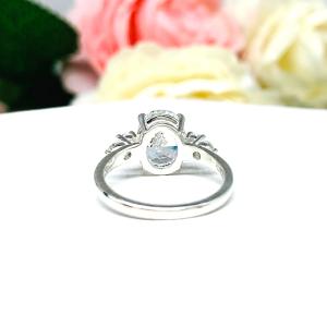 Oval Cubic Zirconia with Four Round Accents Engagement Ring
