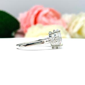 Oval Cubic Zirconia with Four Round Accents Engagement Ring