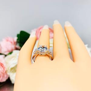Oval Cubic Zirconia with Four Round Accents Engagement Ring