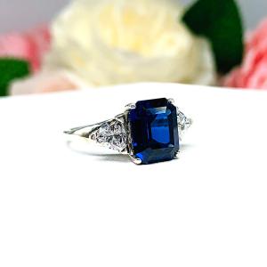 Lab Blue Sapphire Emerald Cut Trillion CZ Ring