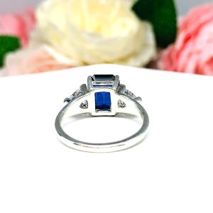 Lab Blue Sapphire Emerald Cut Trillion CZ Ring