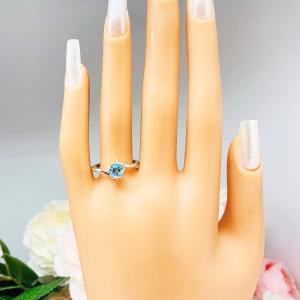 Genuine Swiss Blue Topaz Solitaire Ring - 6mm round gemstone - 6 prong sterling silver bypass setting