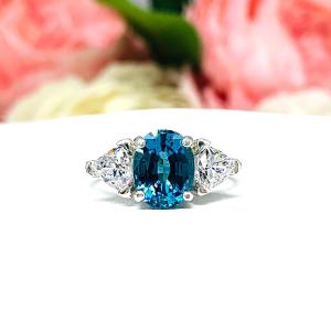 Teal Blue Oval-Cut Lab Gemstone & CZ Trillions 3-Stone Ring • 9x7mm, Sterling Silver, Size 7