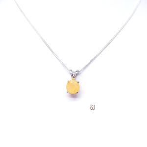 Sterling silver 8mm round Ethiopian opal pendant necklace displayed on a white background. The opal has a translucent gold base.