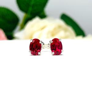 Oval-Cut Lab Ruby Stud Earrings • 7x5mm—9x7mm, Sterling Silver