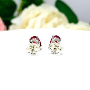 Oval-Cut Lab Ruby Stud Earrings • 7x5mm—9x7mm, Sterling Silver