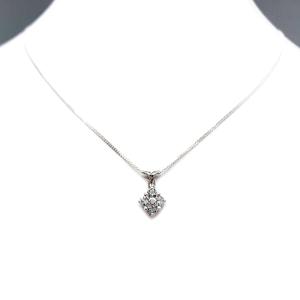 Sterling silver cluster pendant featuring four 3mm round light blue aquamarine gemstones and an elegant twist design bail. Suspended from a delicate sterling silver chain and set against a white background.