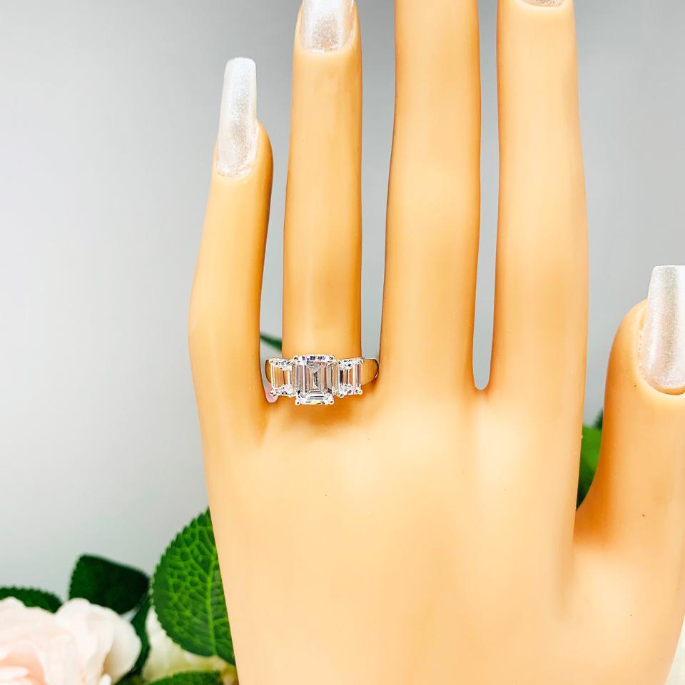 Emerald Cut CZ Three Stone Engagement Ring