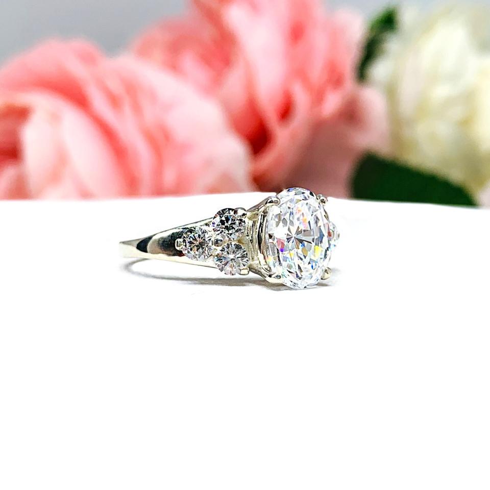Oval Cubic Zirconia Round Accents Engagement Ring