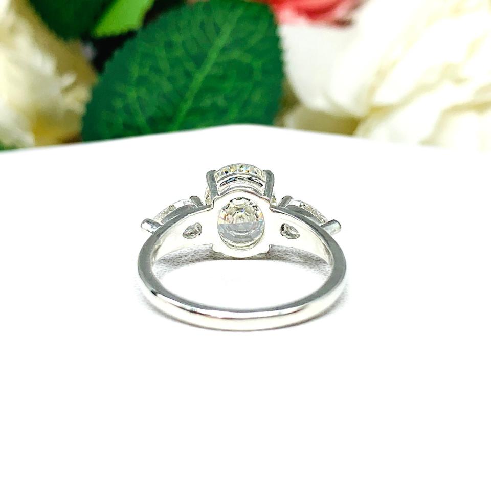 Oval Pear Near Colorless Cubic Zirconia Three Stone Engagement Ring