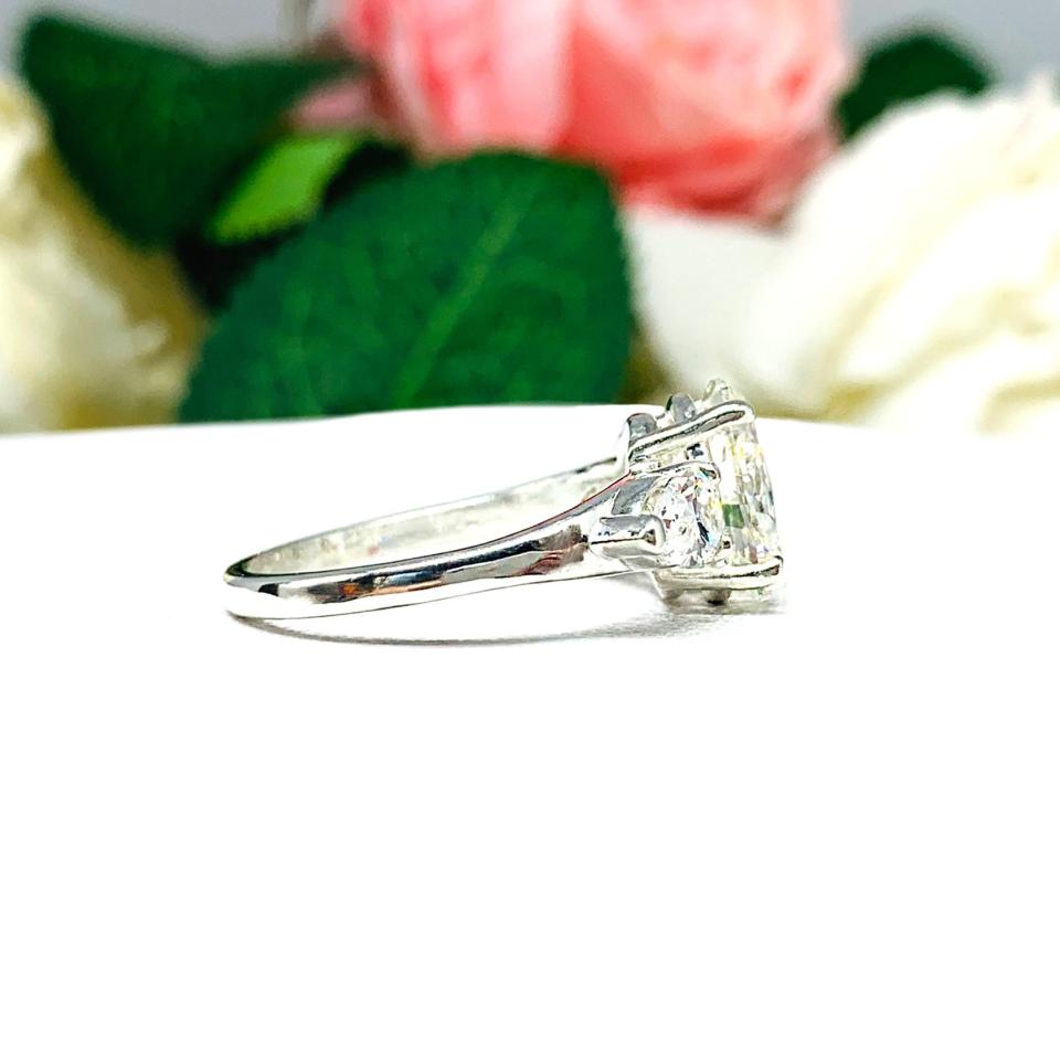 Oval Pear Near Colorless Cubic Zirconia Three Stone Engagement Ring
