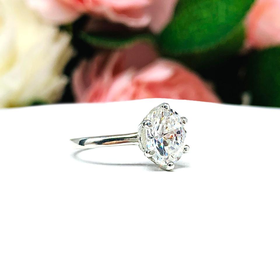 Oval Near Colorless 9x7mm Cubic Zirconia 6 Prong Engagement Ring