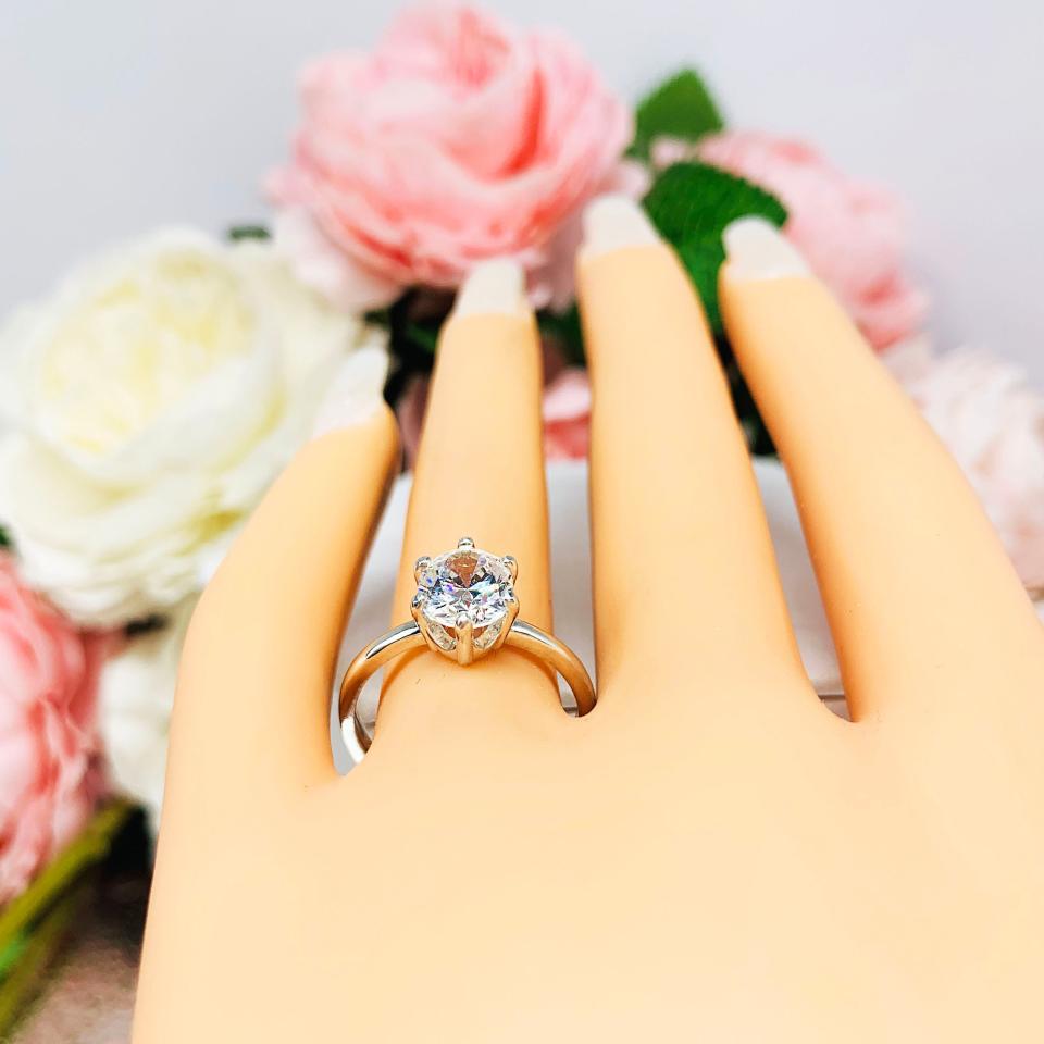 Oval Near Colorless 9x7mm Cubic Zirconia 6 Prong Engagement Ring