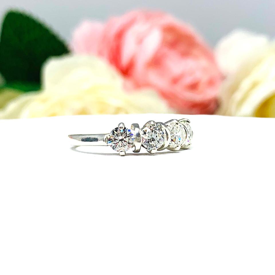 Round Near Colorless 4mm Cubic Zirconia Four Stone Ring