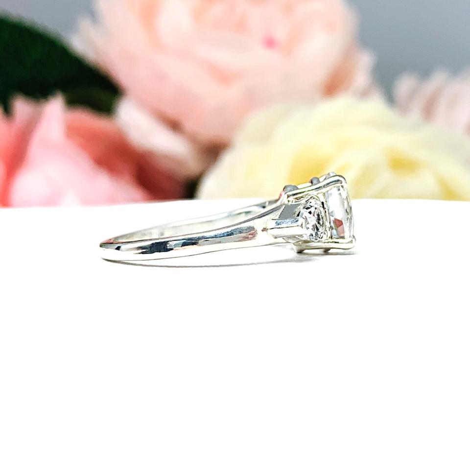 Natural White Topaz Round With Pear Side Stones Ring