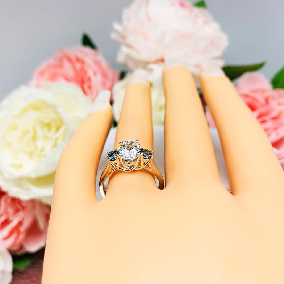 White Topaz 8x6mm Oval with Round London Blue Topaz Ring