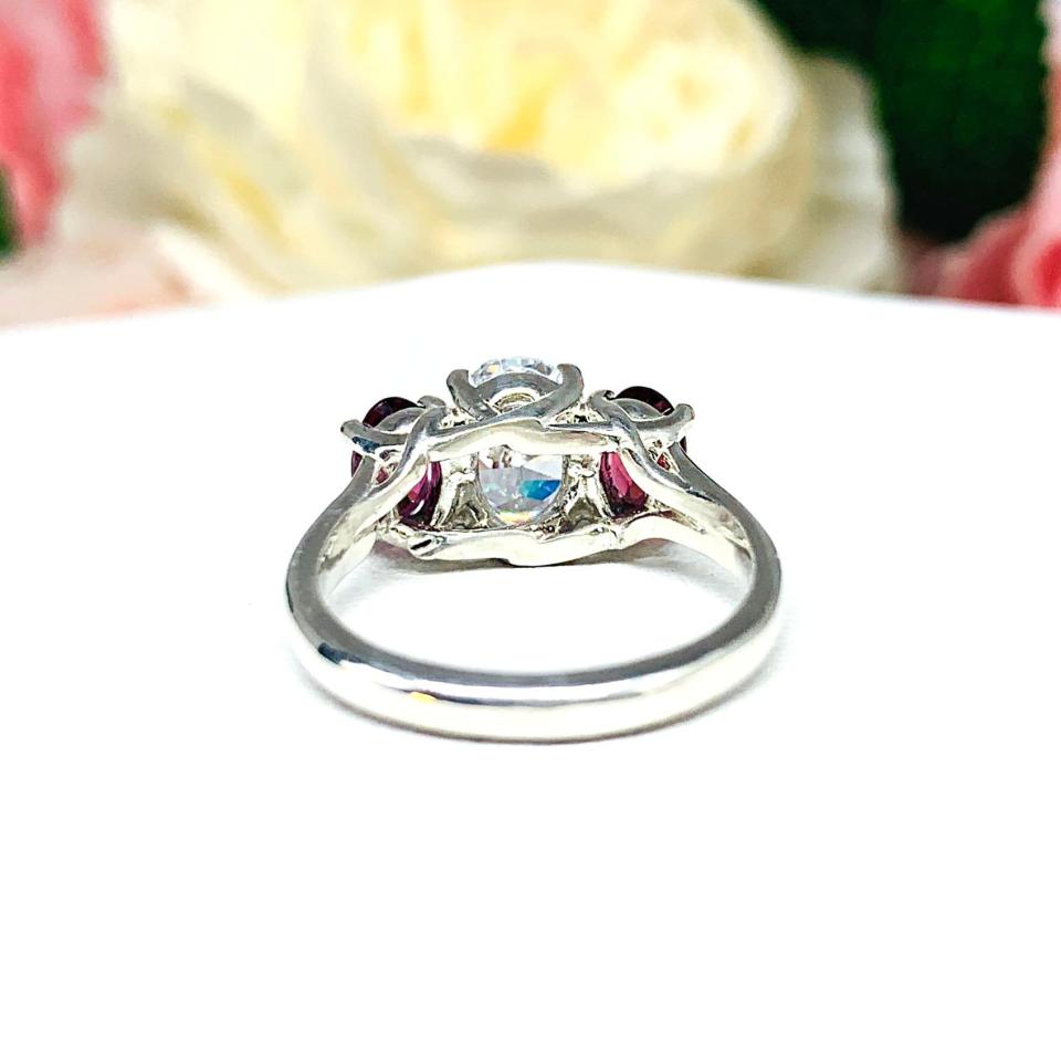 Oval CZ Natural Garnet 3 Stone Engagement Ring - 8x6mm oval center stone - 6x4mm rhodolite garnet - Sterling silver trellis setting