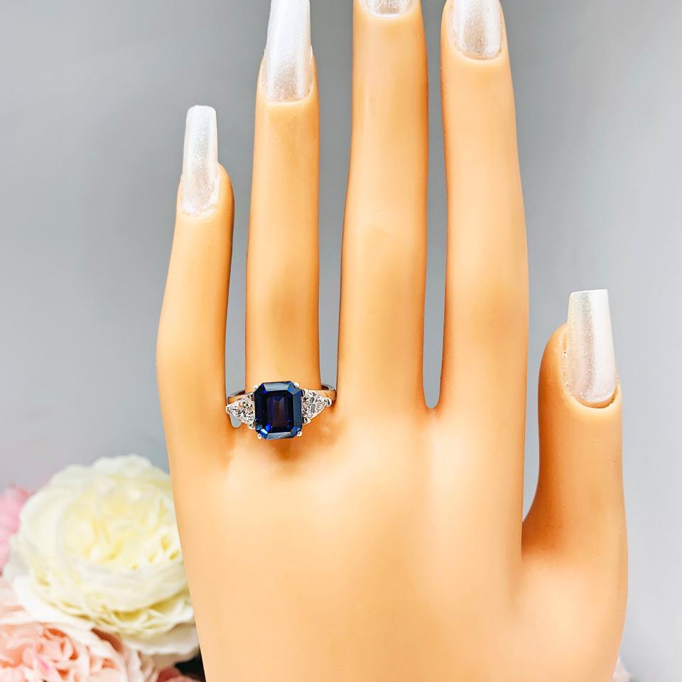 Lab Blue Sapphire Emerald Cut Trillion CZ Ring