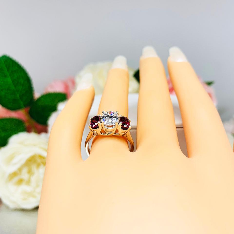 Oval CZ Natural Garnet 3 Stone Engagement Ring - 8x6mm oval center stone - 6x4mm rhodolite garnet - Sterling silver trellis setting