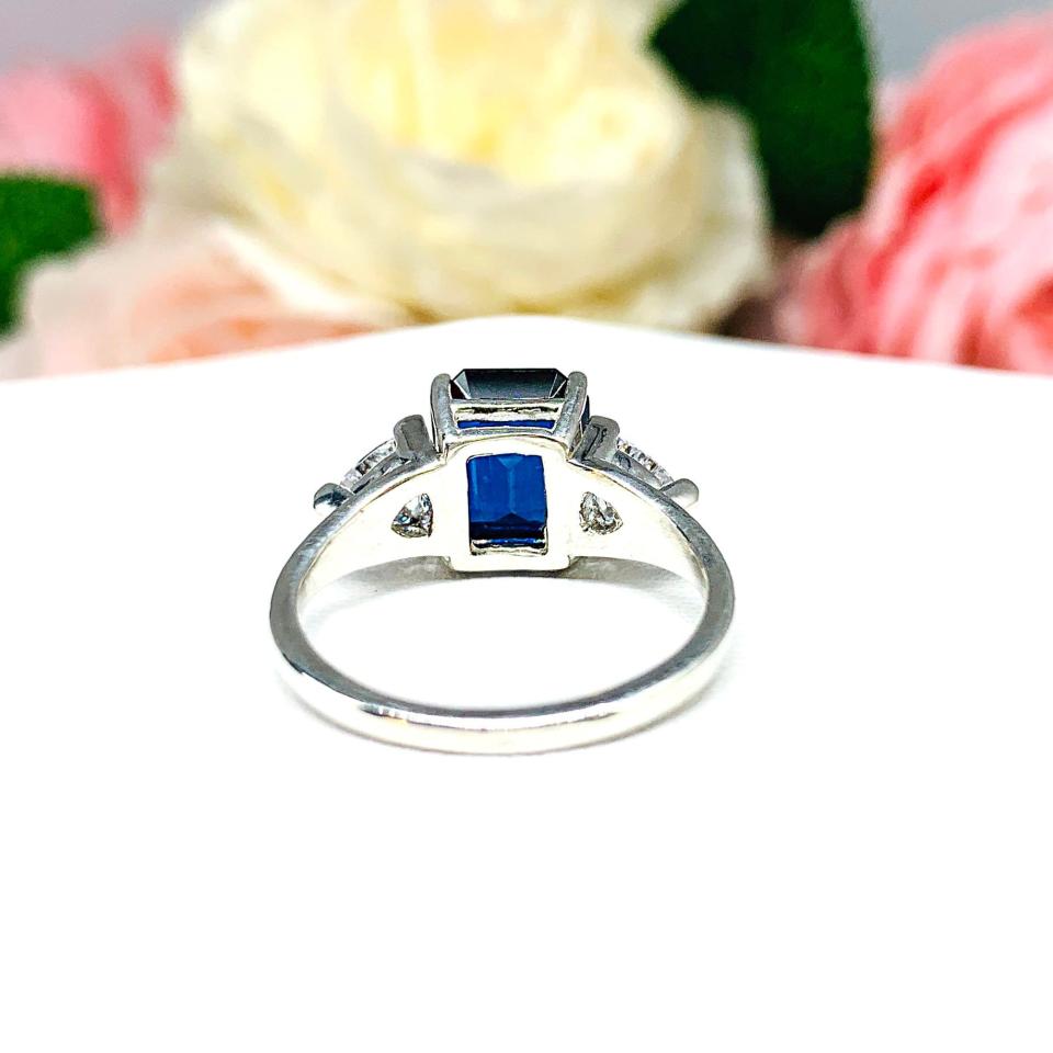 Lab Blue Sapphire Emerald Cut Trillion CZ Ring