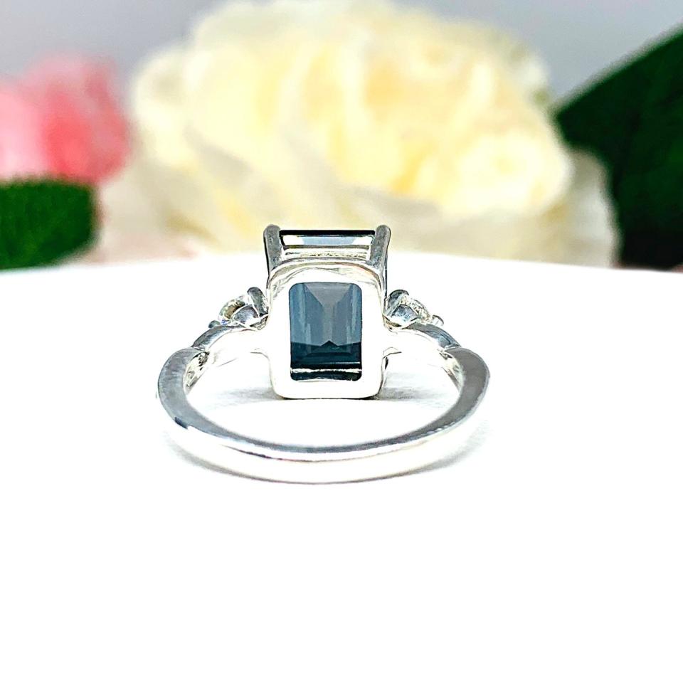 Emerald Cut London Blue Topaz Ring - Moissanite side stones - Sterling Silver twist milgrain band