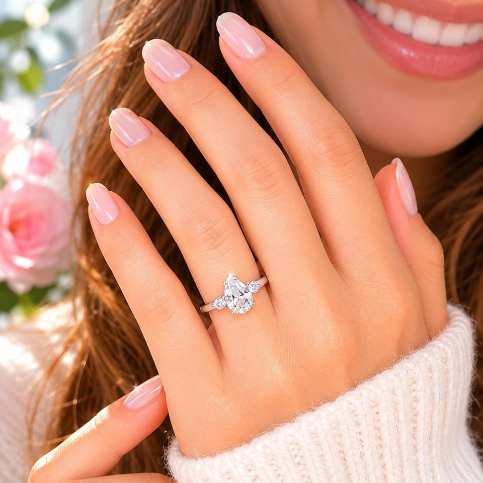 Pear-Cut Lab White Sapphire 3-Stone Ring • 10x7mm, 12x8mm, Round Accents, Sterling Silver