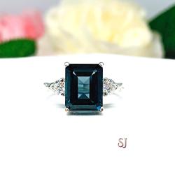 Emerald Cut London Blue Topaz Ring - Moissanite side stones - Sterling Silver twist milgrain band
