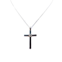 Close up of a sterling silver cross pendant with a 5mm round moissanite set in the center. It is suspended from a delicate chain and against a white background.