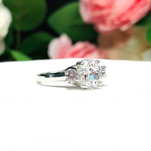 Oval CZ Round Accents Engagement Ring 8x6mm 1.25 Carats