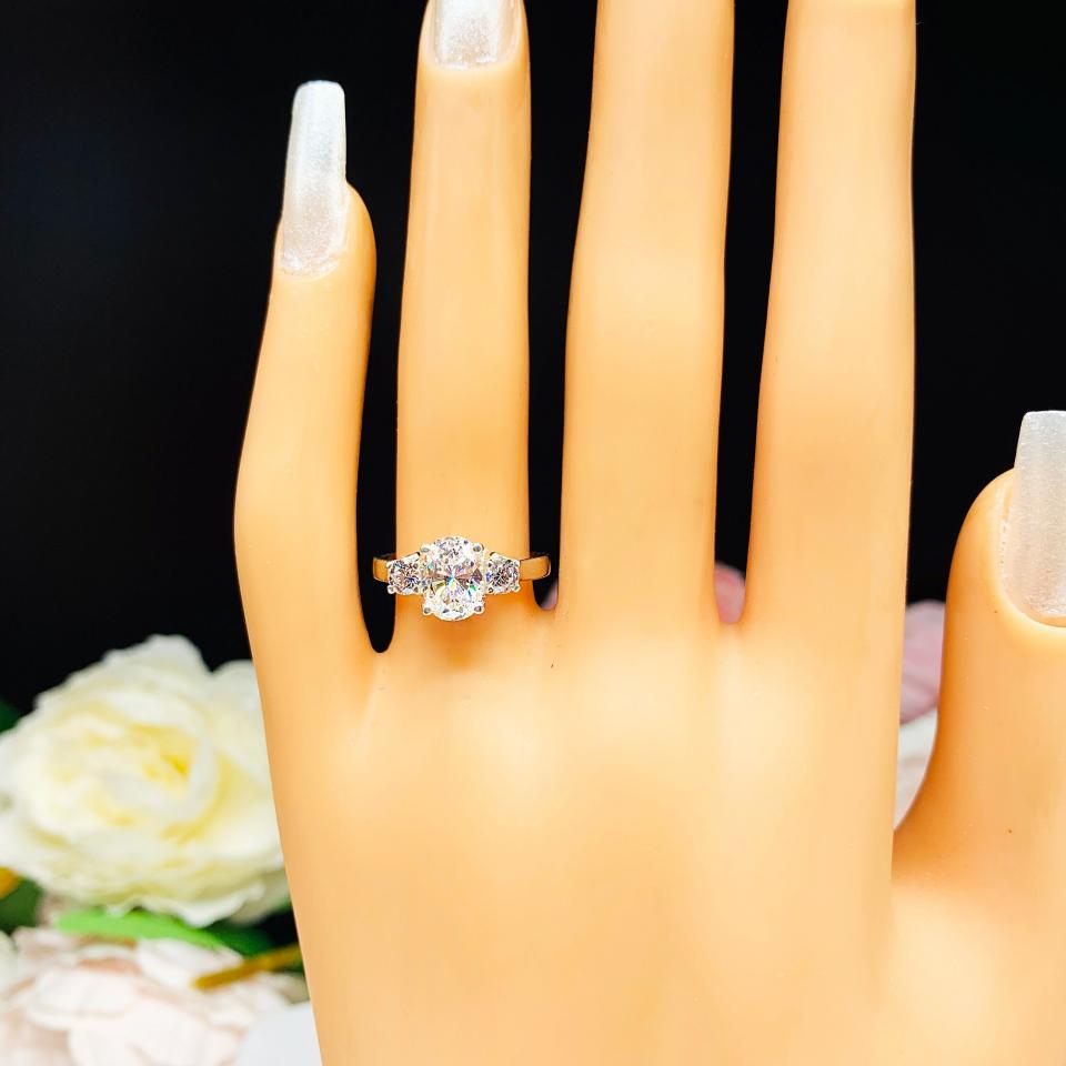Oval CZ Round Accents Engagement Ring 8x6mm 1.25 Carats