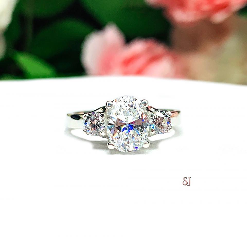 Oval CZ Round Accents Engagement Ring 8x6mm 1.25 Carats